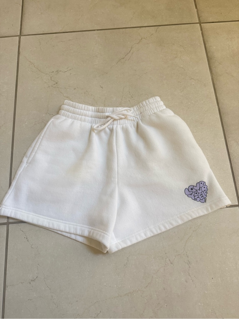 White Fox Boutique White Athletic Shorts with Purple Heart Logo
